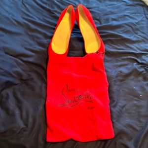 Red Christian Louboutin heels